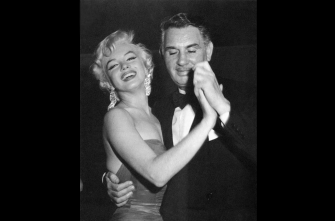 Charles Feldman dancing with Marilyn Monroe