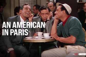 An American in Paris Film Still - Gene Kelly, Benny Carter, Gino Corrado, Paul Cristo, Georges Guétary, Oscar Levant, and Waclaw Rekwart