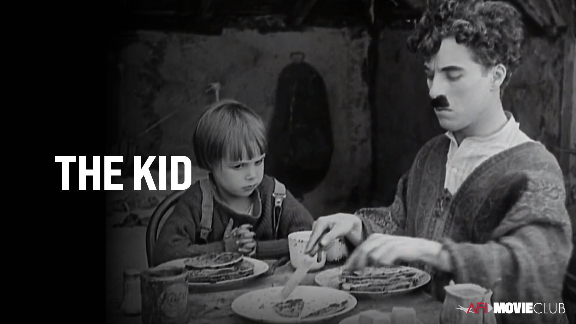 The Kid Film Still - Charles Chaplin and Jackie Coogan