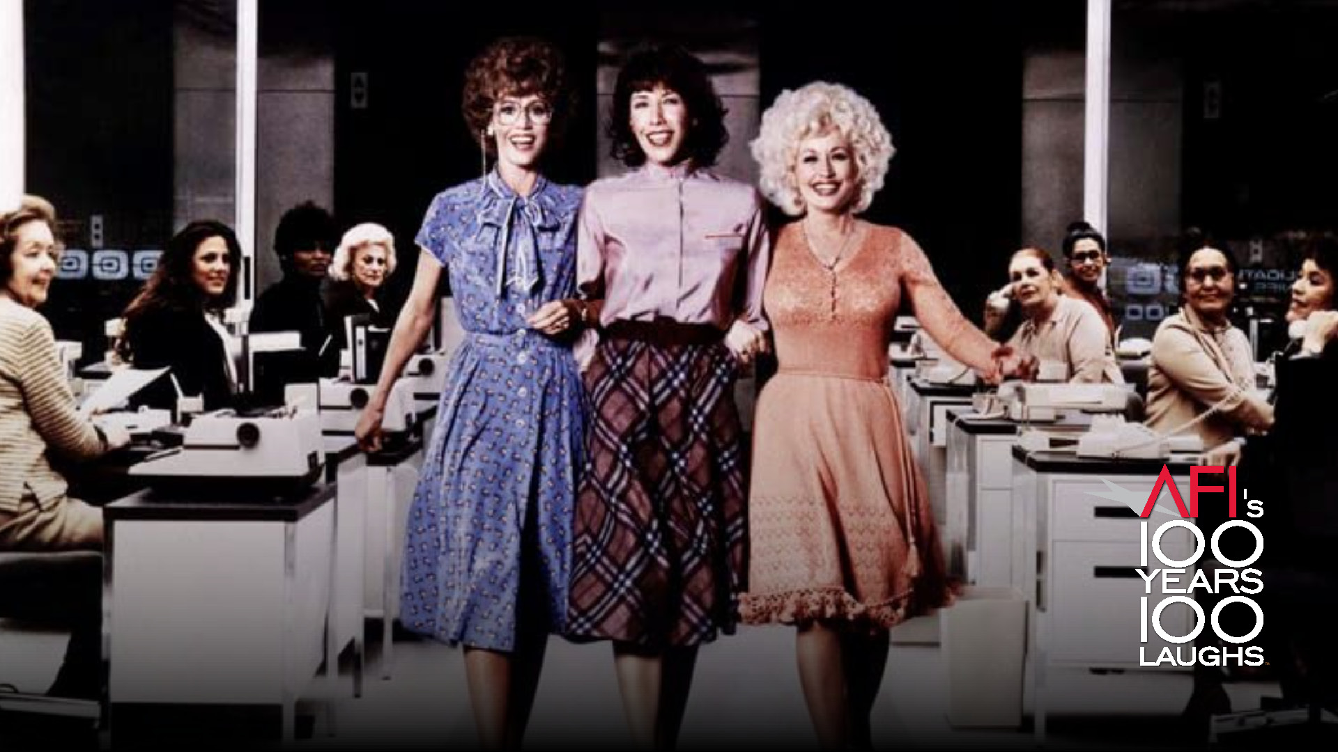 Still image from NINE TO FIVE featuring (L to R) Jane Fonda, Lily Tomlin and Dolly Parton.