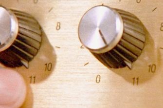THIS IS SPINAL TAP film still of hand on a dial