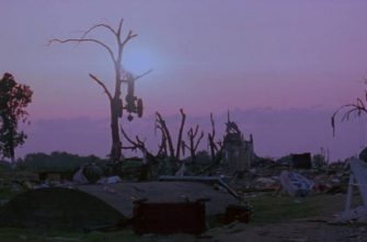 TWISTER film still of a home torn apart by a tornado