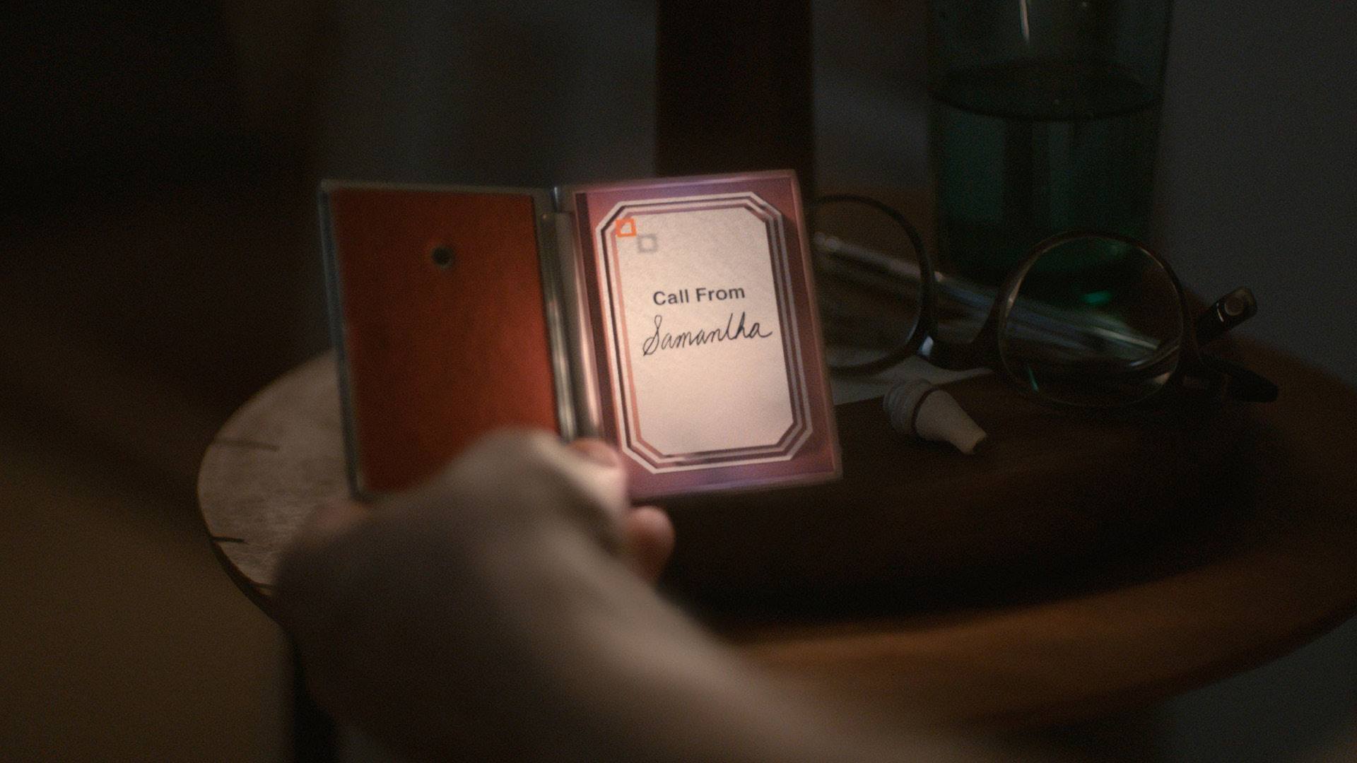 HER film still of a note that reads "Call from Samantha"
