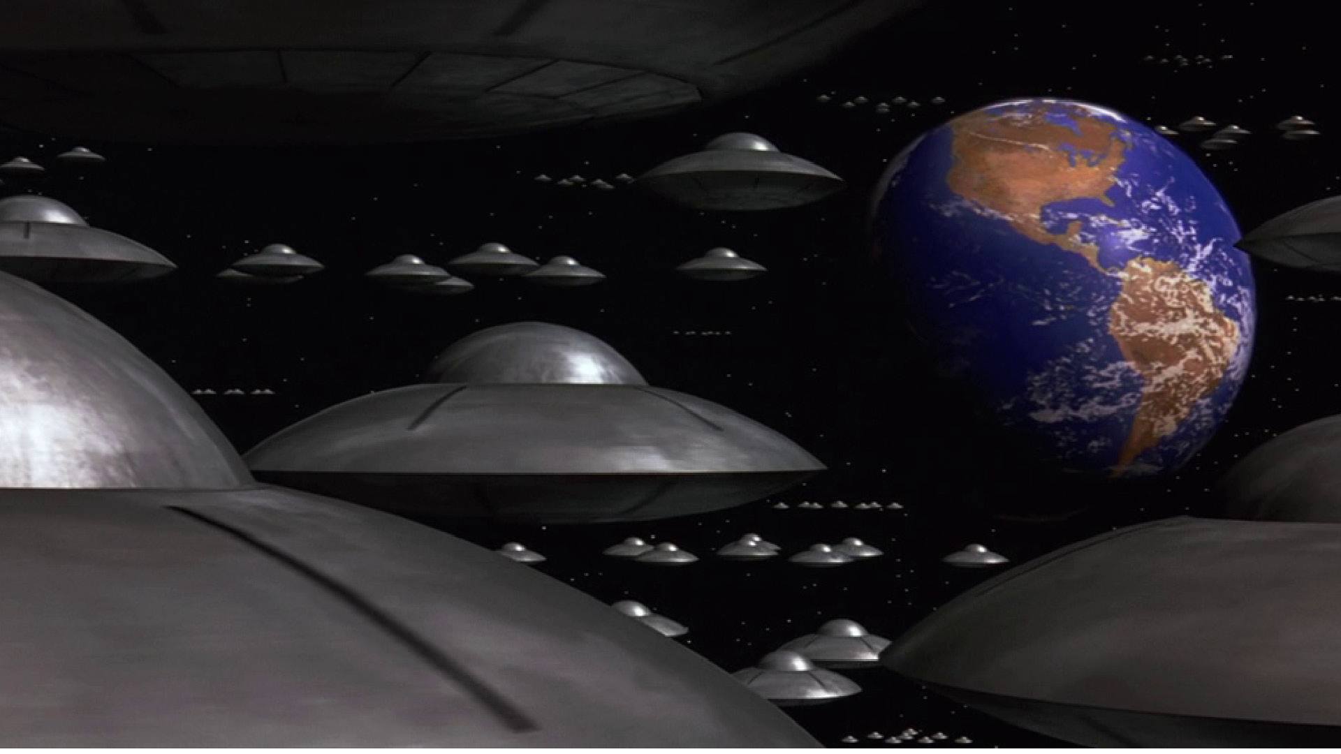 MARS ATTACKS! film still of Earth and black space ships