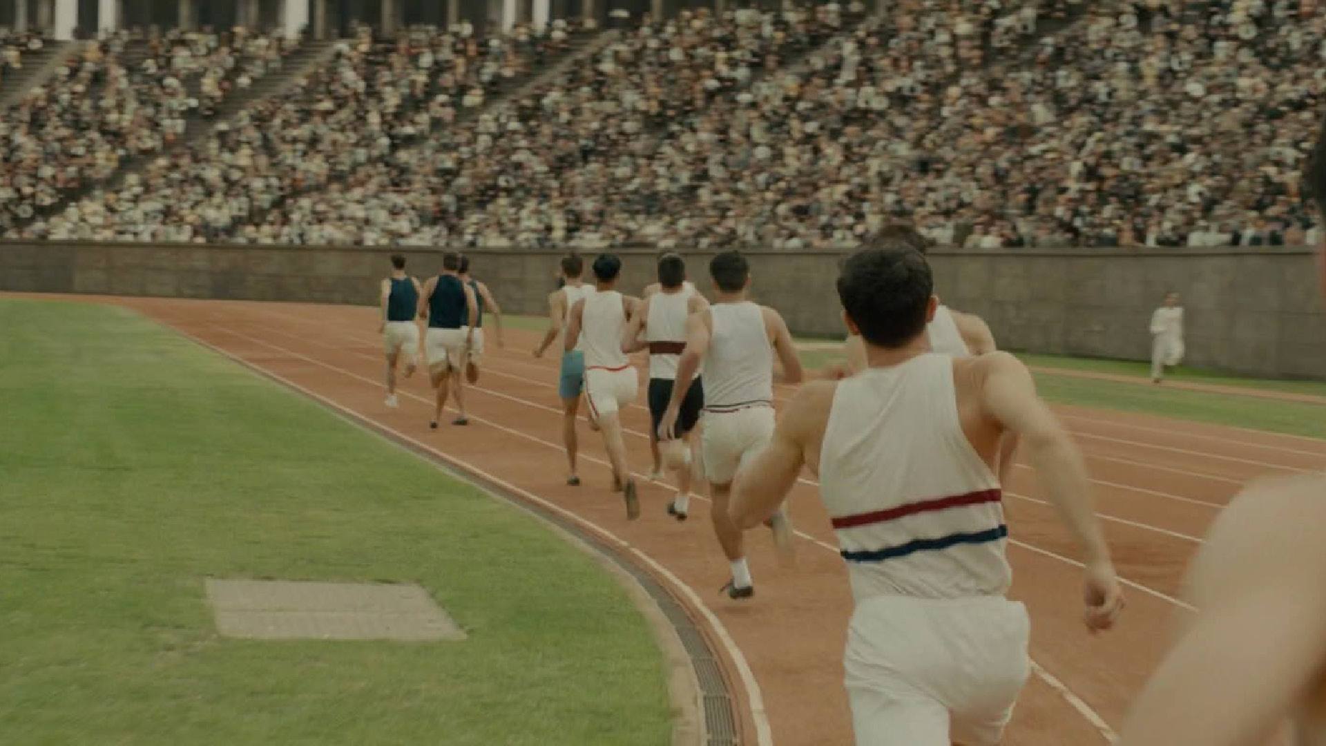 UNBROKEN film still of men running track