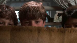 THE GOONIES film still of Sean Astin, Corey Feldman, Jeff Cohen, and Ke Huy Quan.
